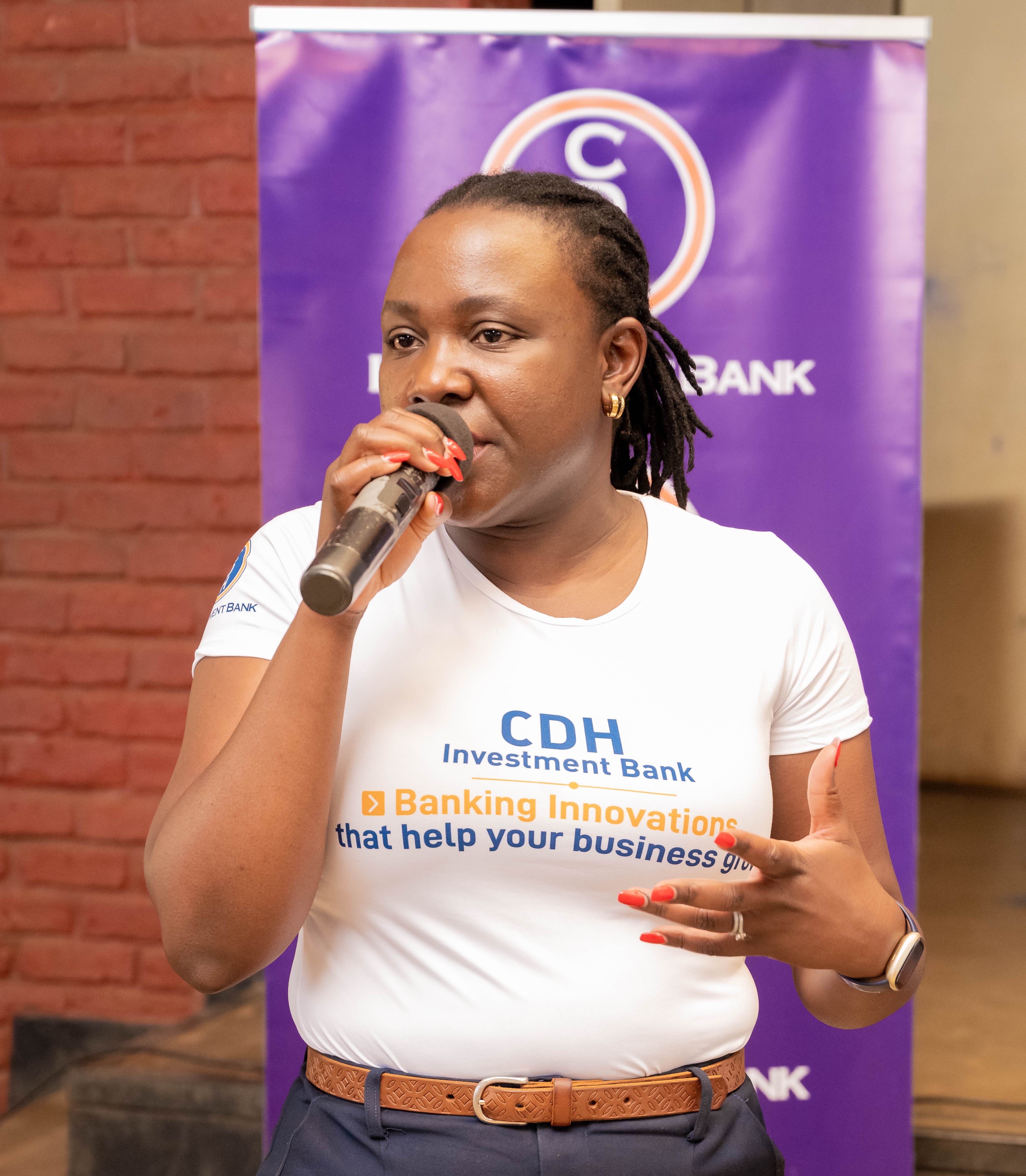 CDH Investment Bank Capital City Banking Centre Manager, Mercy Sekani engages students at Chipasula Secondary School during the school savings talk 